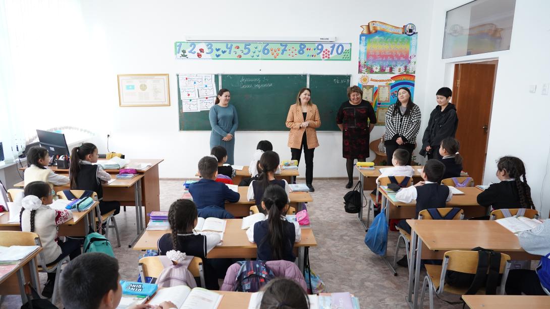 Teach For Qazaqstan staff visit a classroom